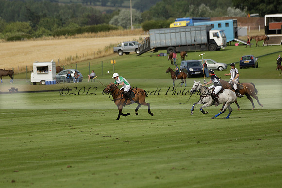 Jaeger Le Coultre (black)  v Wairakei Pastoral (white) in a Jaeger Le Coultre Holden White Cup polo match played on 29 July 2013 at Cowdray Park Polo Club on Brooksfieldwww.polopictures.co.uk