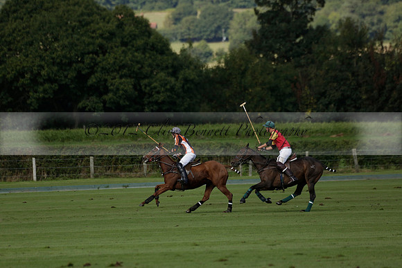 Four Quarters Black (black) v BHC (red) in a Autumn Cup polo match on Ambersham 2 at Cowdray Park Polo Club on Friday 20 September 2013 www.polopictures.co.uk