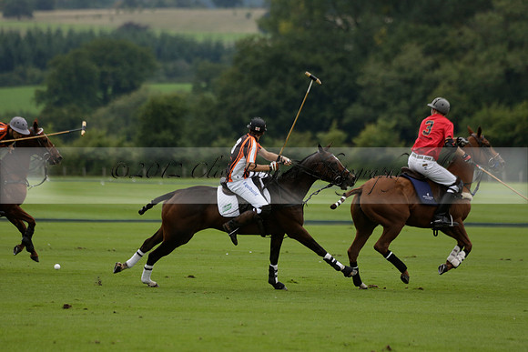 Four Quarters Black (black) v Clashleigh (red) in the Autumn Cup subsidiary final polo match on Ambersham 2 at Cowdray Park Polo Club on Sunday 22 September 2013 www.polopictures.co.uk