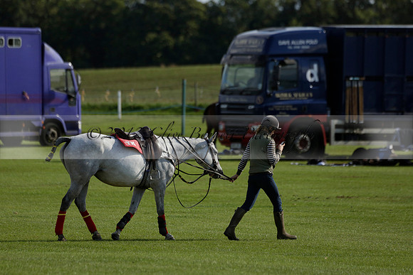 Aryana (black) v Shoreline (yellow) in a Farewell Cup polo match played on Ambersham 5 at Cowdray Park Polo Club on Wednesday 18 September 2013. www.polopictures.co.uk