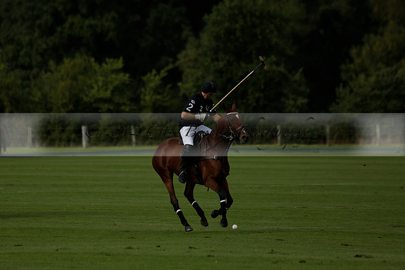 Aryana (black) v Shoreline (yellow) in a Farewell Cup polo match played on Ambersham 5 at Cowdray Park Polo Club on Wednesday 18 September 2013. www.polopictures.co.uk