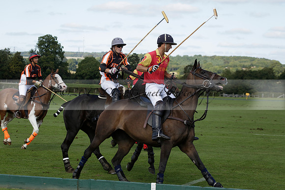 Four Quarters Black (black) v BHC (red) in a Autumn Cup polo match on Ambersham 2 at Cowdray Park Polo Club on Friday 20 September 2013 www.polopictures.co.uk