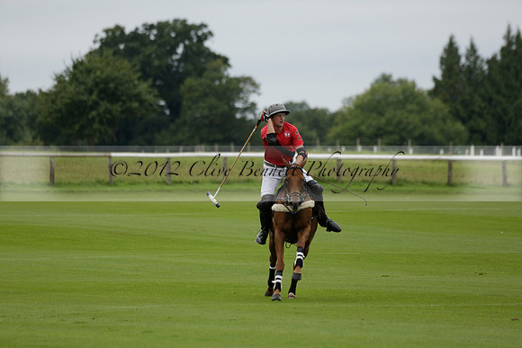 Four Quarters Black (black) v Clashleigh (red) in the Autumn Cup subsidiary final polo match on Ambersham 2 at Cowdray Park Polo Club on Sunday 22 September 2013 www.polopictures.co.uk