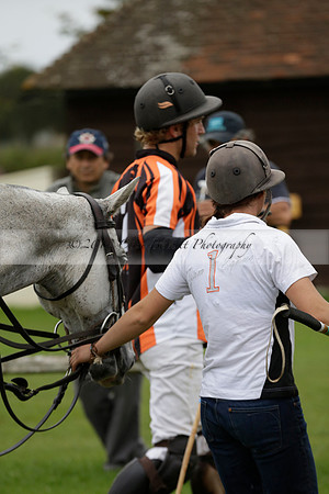 Four Quarters Black (black) v Clashleigh (red) in the Autumn Cup subsidiary final polo match on Ambersham 2 at Cowdray Park Polo Club on Sunday 22 September 2013 www.polopictures.co.uk