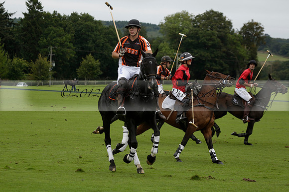 Four Quarters Black (black) v Clashleigh (red) in the Autumn Cup subsidiary final polo match on Ambersham 2 at Cowdray Park Polo Club on Sunday 22 September 2013 www.polopictures.co.uk