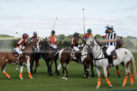 Four Quarters Black (black) v BHC (red) in a Autumn Cup polo match on Ambersham 2 at Cowdray Park Polo Club on Friday 20 September 2013 www.polopictures.co.uk