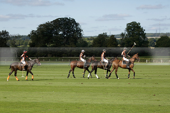 Four Quarters Black (black) v BHC (red) in a Autumn Cup polo match on Ambersham 2 at Cowdray Park Polo Club on Friday 20 September 2013 www.polopictures.co.uk