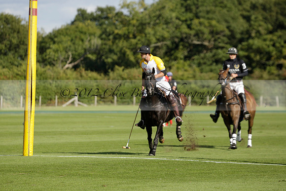 Aryana (black) v Shoreline (yellow) in a Farewell Cup polo match played on Ambersham 5 at Cowdray Park Polo Club on Wednesday 18 September 2013. www.polopictures.co.uk