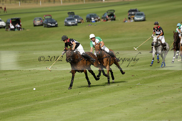 Jaeger Le Coultre (black)  v Wairakei Pastoral (white) in a Jaeger Le Coultre Holden White Cup polo match played on 29 July 2013 at Cowdray Park Polo Club on Brooksfieldwww.polopictures.co.uk