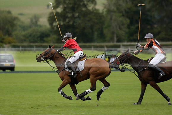 Four Quarters Black (black) v Clashleigh (red) in the Autumn Cup subsidiary final polo match on Ambersham 2 at Cowdray Park Polo Club on Sunday 22 September 2013 www.polopictures.co.uk