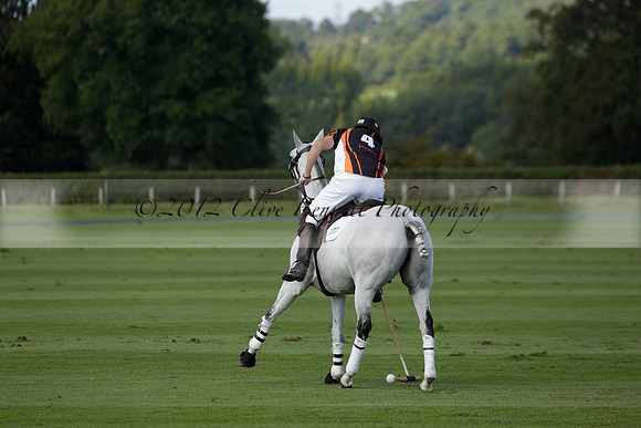 Four Quarters Black (black) v BHC (red) in a Autumn Cup polo match on Ambersham 2 at Cowdray Park Polo Club on Friday 20 September 2013 www.polopictures.co.uk