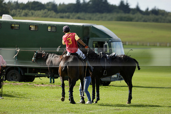 Four Quarters Black (black) v BHC (red) in a Autumn Cup polo match on Ambersham 2 at Cowdray Park Polo Club on Friday 20 September 2013 www.polopictures.co.uk