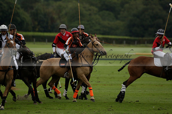 Four Quarters Black (black) v Clashleigh (red)in a Jaeger Le Coultre Autumn Cup polo match played on Ambersham 2 at Cowdray Park Polo Club on Wednesday 2013.09.11 www.polopictures.co.uk