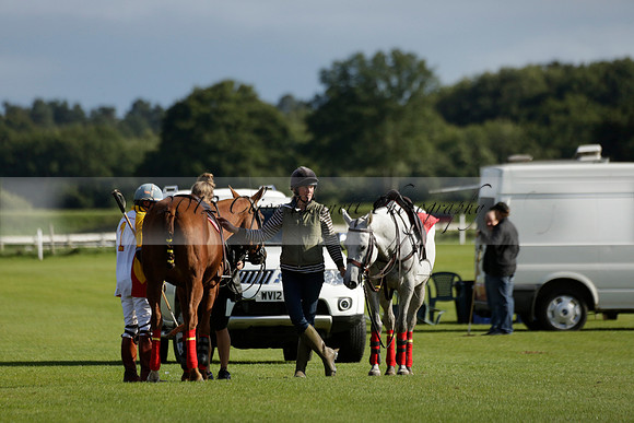 Aryana (black) v Shoreline (yellow) in a Farewell Cup polo match played on Ambersham 5 at Cowdray Park Polo Club on Wednesday 18 September 2013. www.polopictures.co.uk