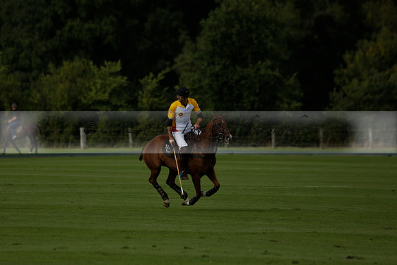Aryana (black) v Shoreline (yellow) in a Farewell Cup polo match played on Ambersham 5 at Cowdray Park Polo Club on Wednesday 18 September 2013. www.polopictures.co.uk