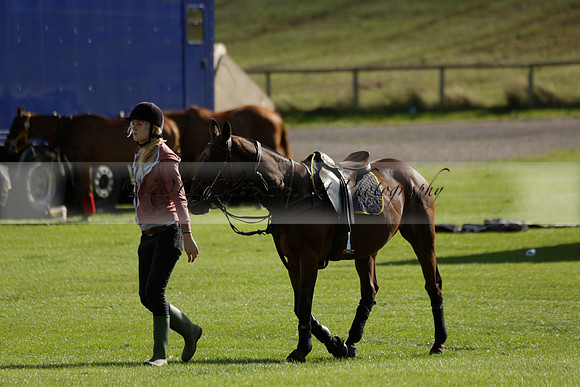 Aryana (black) v Shoreline (yellow) in a Farewell Cup polo match played on Ambersham 5 at Cowdray Park Polo Club on Wednesday 18 September 2013. www.polopictures.co.uk