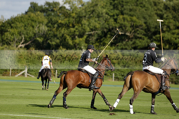 Aryana (black) v Shoreline (yellow) in a Farewell Cup polo match played on Ambersham 5 at Cowdray Park Polo Club on Wednesday 18 September 2013. www.polopictures.co.uk
