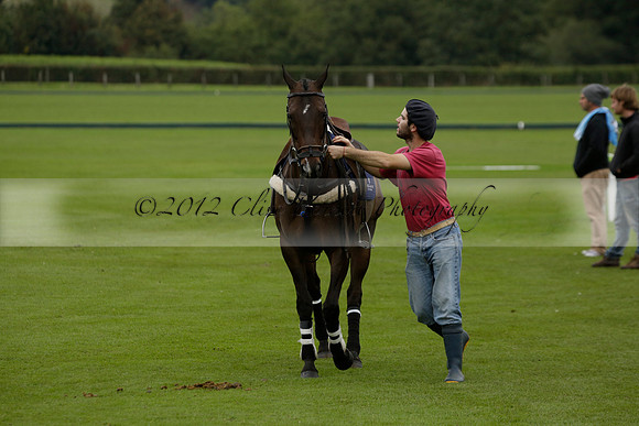 Four Quarters Black (black) v Clashleigh (red) in the Autumn Cup subsidiary final polo match on Ambersham 2 at Cowdray Park Polo Club on Sunday 22 September 2013 www.polopictures.co.uk