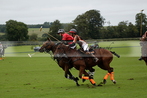 Four Quarters Black (black) v Clashleigh (red) in the Autumn Cup subsidiary final polo match on Ambersham 2 at Cowdray Park Polo Club on Sunday 22 September 2013 www.polopictures.co.uk