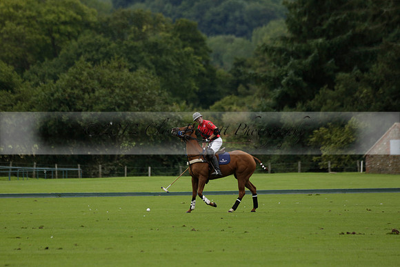 Four Quarters Black (black) v Clashleigh (red) in the Autumn Cup subsidiary final polo match on Ambersham 2 at Cowdray Park Polo Club on Sunday 22 September 2013 www.polopictures.co.uk