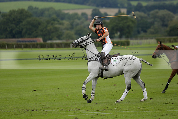 Four Quarters Black (black) v Clashleigh (red) in the Autumn Cup subsidiary final polo match on Ambersham 2 at Cowdray Park Polo Club on Sunday 22 September 2013 www.polopictures.co.uk