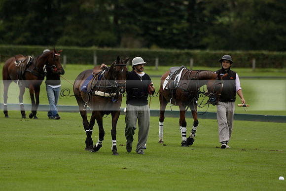 Four Quarters Black (black) v Clashleigh (red) in the Autumn Cup subsidiary final polo match on Ambersham 2 at Cowdray Park Polo Club on Sunday 22 September 2013 www.polopictures.co.uk