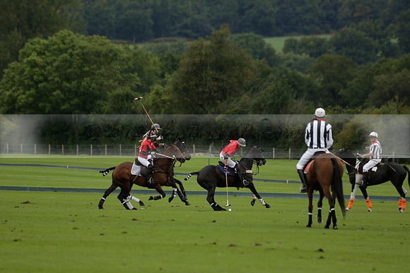 Four Quarters Black (black) v Clashleigh (red) in the Autumn Cup subsidiary final polo match on Ambersham 2 at Cowdray Park Polo Club on Sunday 22 September 2013 www.polopictures.co.uk
