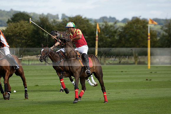 Four Quarters Black (black) v BHC (red) in a Autumn Cup polo match on Ambersham 2 at Cowdray Park Polo Club on Friday 20 September 2013 www.polopictures.co.uk