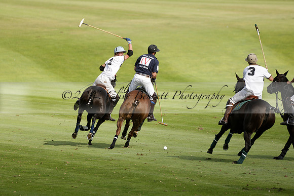 Pandas (white) v Home Farm (navy) in a Park House West Sussex Cup Polo match on Brooksfield at Cowdray Park Polo Club on Friday 30 August 2013. 2013.08.30 www.polopictures.co.uk