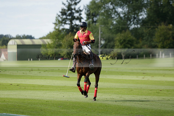 Four Quarters Black (black) v BHC (red) in a Autumn Cup polo match on Ambersham 2 at Cowdray Park Polo Club on Friday 20 September 2013 www.polopictures.co.uk