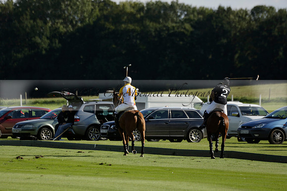 Aryana (black) v Shoreline (yellow) in a Farewell Cup polo match played on Ambersham 5 at Cowdray Park Polo Club on Wednesday 18 September 2013. www.polopictures.co.uk