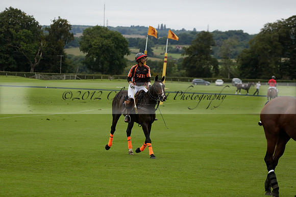 Four Quarters Black (black) v Clashleigh (red) in the Autumn Cup subsidiary final polo match on Ambersham 2 at Cowdray Park Polo Club on Sunday 22 September 2013 www.polopictures.co.uk