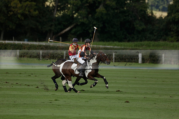 Four Quarters Black (black) v BHC (red) in a Autumn Cup polo match on Ambersham 2 at Cowdray Park Polo Club on Friday 20 September 2013 www.polopictures.co.uk