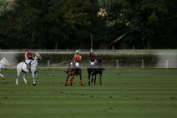 Four Quarters Black (black) v BHC (red) in a Autumn Cup polo match on Ambersham 2 at Cowdray Park Polo Club on Friday 20 September 2013 www.polopictures.co.uk