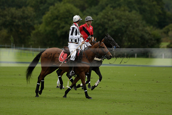 Four Quarters Black (black) v Clashleigh (red) in the Autumn Cup subsidiary final polo match on Ambersham 2 at Cowdray Park Polo Club on Sunday 22 September 2013 www.polopictures.co.uk