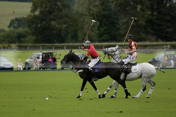 Four Quarters Black (black) v Clashleigh (red) in the Autumn Cup subsidiary final polo match on Ambersham 2 at Cowdray Park Polo Club on Sunday 22 September 2013 www.polopictures.co.uk