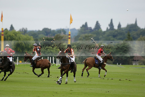 Four Quarters Black (black) v Clashleigh (red) in the Autumn Cup subsidiary final polo match on Ambersham 2 at Cowdray Park Polo Club on Sunday 22 September 2013 www.polopictures.co.uk