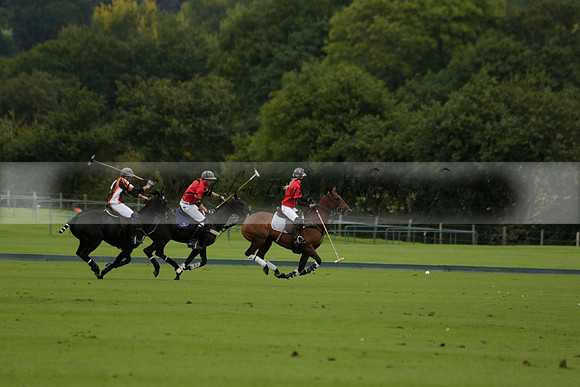 Four Quarters Black (black) v Clashleigh (red) in the Autumn Cup subsidiary final polo match on Ambersham 2 at Cowdray Park Polo Club on Sunday 22 September 2013 www.polopictures.co.uk