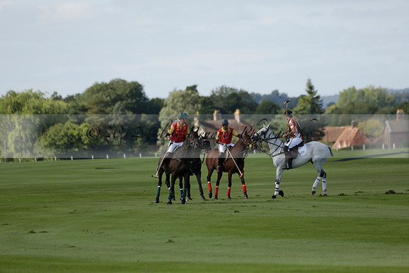Four Quarters Black (black) v BHC (red) in a Autumn Cup polo match on Ambersham 2 at Cowdray Park Polo Club on Friday 20 September 2013 www.polopictures.co.uk