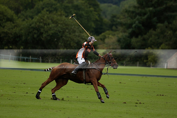 Four Quarters Black (black) v Clashleigh (red) in the Autumn Cup subsidiary final polo match on Ambersham 2 at Cowdray Park Polo Club on Sunday 22 September 2013 www.polopictures.co.uk