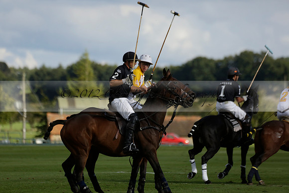 Aryana (black) v Shoreline (yellow) in a Farewell Cup polo match played on Ambersham 5 at Cowdray Park Polo Club on Wednesday 18 September 2013. www.polopictures.co.uk