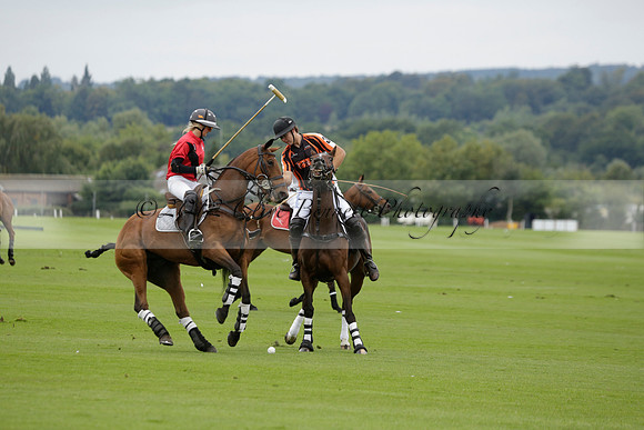 Four Quarters Black (black) v Clashleigh (red) in the Autumn Cup subsidiary final polo match on Ambersham 2 at Cowdray Park Polo Club on Sunday 22 September 2013 www.polopictures.co.uk