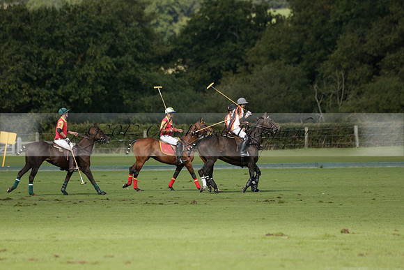 Four Quarters Black (black) v BHC (red) in a Autumn Cup polo match on Ambersham 2 at Cowdray Park Polo Club on Friday 20 September 2013 www.polopictures.co.uk
