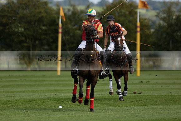 Four Quarters Black (black) v BHC (red) in a Autumn Cup polo match on Ambersham 2 at Cowdray Park Polo Club on Friday 20 September 2013 www.polopictures.co.uk