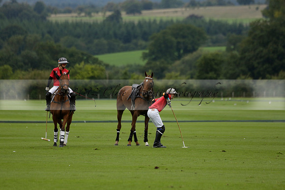 Four Quarters Black (black) v Clashleigh (red) in the Autumn Cup subsidiary final polo match on Ambersham 2 at Cowdray Park Polo Club on Sunday 22 September 2013 www.polopictures.co.uk