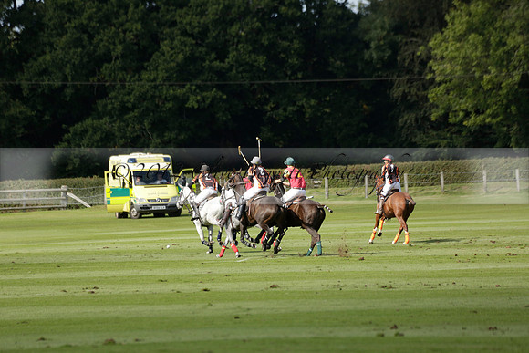 Four Quarters Black (black) v BHC (red) in a Autumn Cup polo match on Ambersham 2 at Cowdray Park Polo Club on Friday 20 September 2013 www.polopictures.co.uk