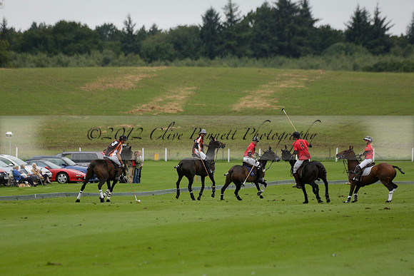 Four Quarters Black (black) v Clashleigh (red) in the Autumn Cup subsidiary final polo match on Ambersham 2 at Cowdray Park Polo Club on Sunday 22 September 2013 www.polopictures.co.uk