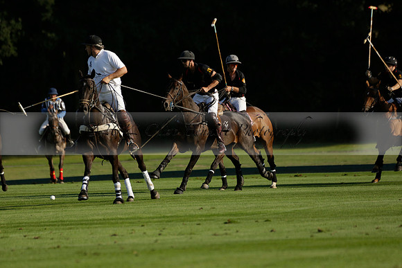 Pluma Negra (white) v Shoreline (black) in the Brecknock Cup Subsidiary final polo match played on Sunday 25 August 2013 at Cowdray Park Polo Club on Ambersham 1. 2013.10.12 www.polopictures.co.uk