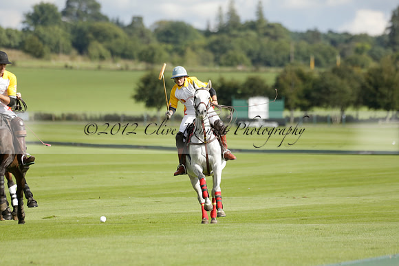 Aryana (black) v Shoreline (yellow) in a Farewell Cup polo match played on Ambersham 5 at Cowdray Park Polo Club on Wednesday 18 September 2013. www.polopictures.co.uk