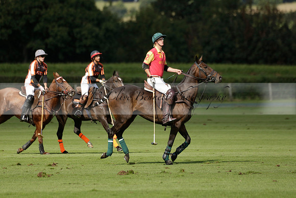 Four Quarters Black (black) v BHC (red) in a Autumn Cup polo match on Ambersham 2 at Cowdray Park Polo Club on Friday 20 September 2013 www.polopictures.co.uk